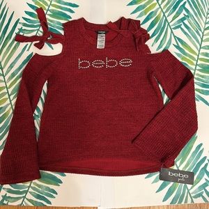 BEBE girls cold shoulder sweater size (L-14).  NWT
